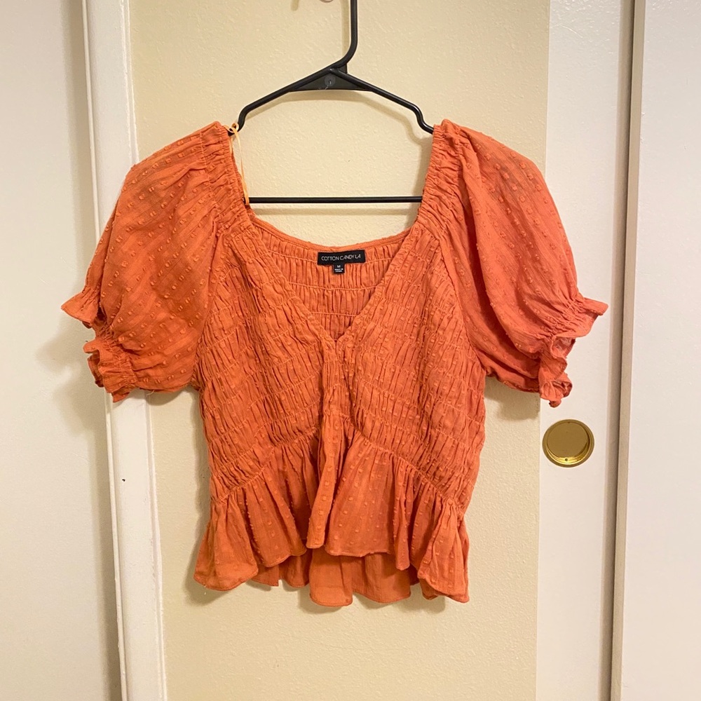 salmon pink top